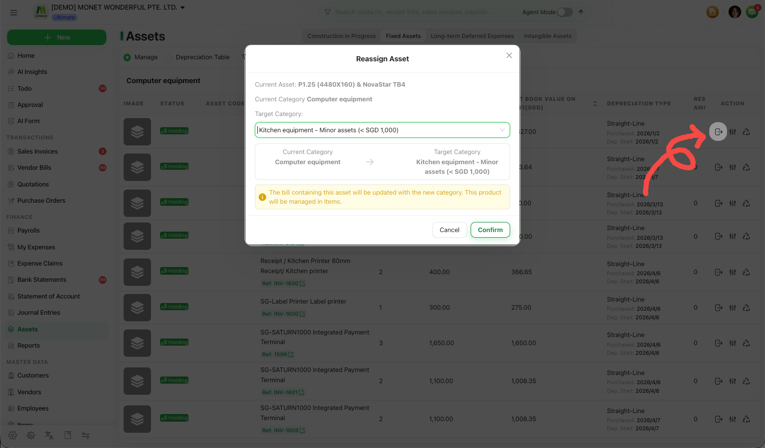 The Reassign Asset modal showing current category and a target category selector
